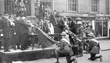 Presentation of colours to the 1st Canadian Motor Machine Gun Brigade.